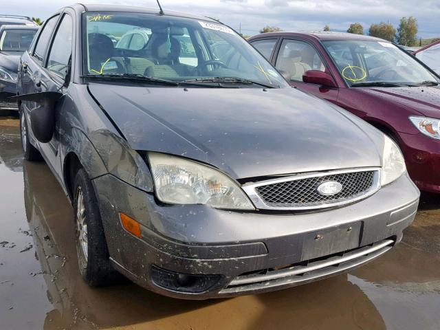 1FAHP34N07W356791 - 2007 FORD FOCUS ZX4 GRAY photo 1