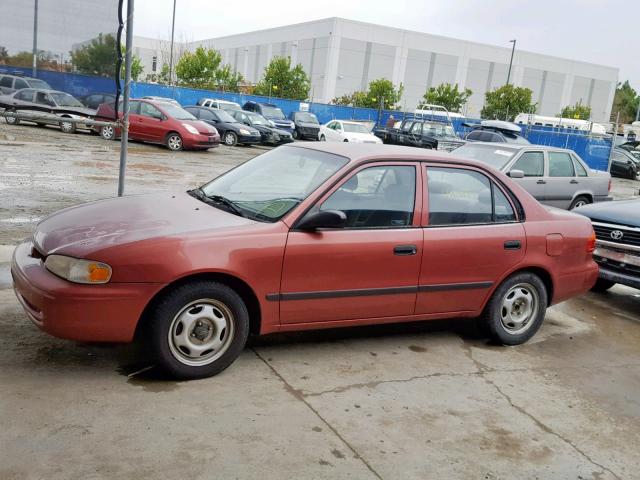 1Y1SK5288WZ416591 - 1998 CHEVROLET GEO PRIZM RED photo 9