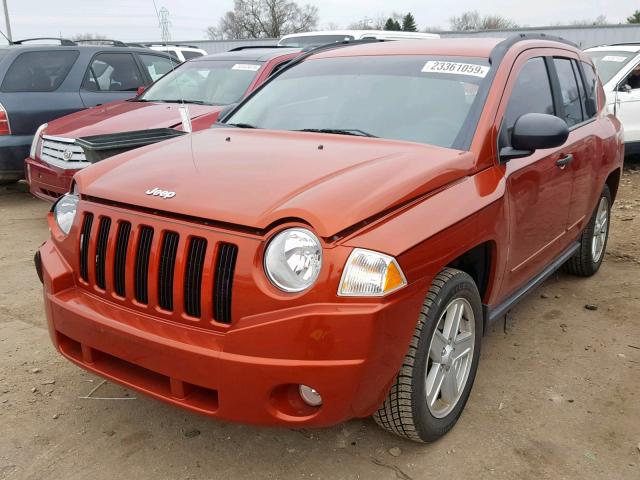 1J4NF4FB1AD505540 - 2010 JEEP COMPASS SP ORANGE photo 2