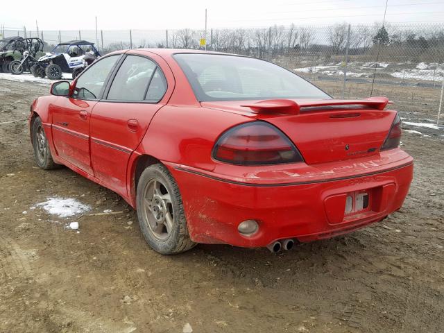 1G2NW52E62C106050 - 2002 PONTIAC GRAND AM G RED photo 3