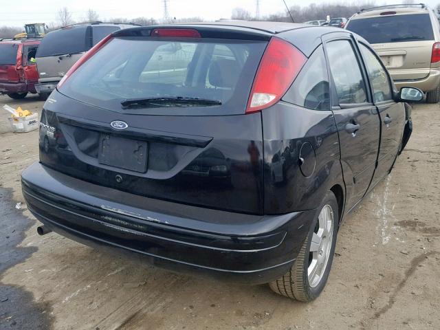 1FAHP37N67W314024 - 2007 FORD FOCUS ZX5 BLACK photo 4