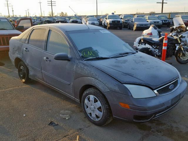 1FAFP34N77W290215 - 2007 FORD FOCUS ZX4 GRAY photo 1