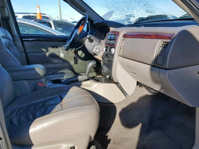 1J8GX58N64C128974 - 2004 JEEP GRAND CHER BLUE photo 5