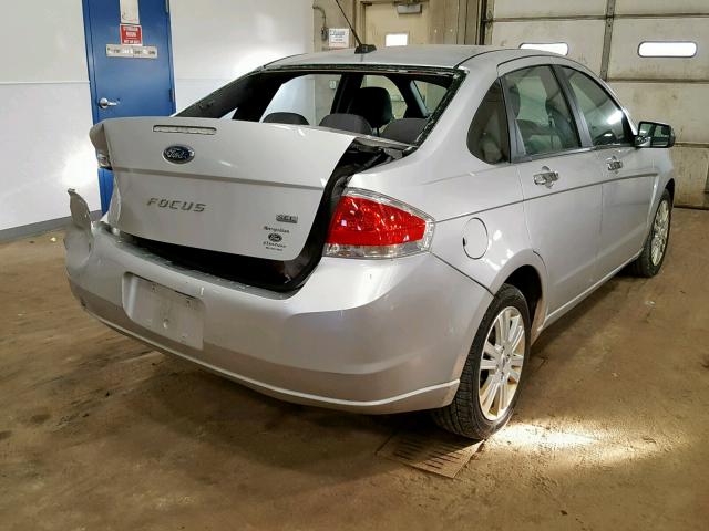 1FAHP3HN0AW280104 - 2010 FORD FOCUS SEL SILVER photo 4