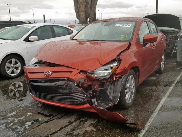 3MYDLBZV3GY102543 - 2016 TOYOTA SCION IA RED photo 2