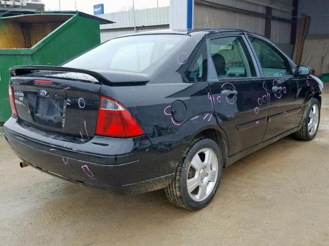 1FAHP34N17W243187 - 2007 FORD FOCUS ZX4 BLACK photo 4