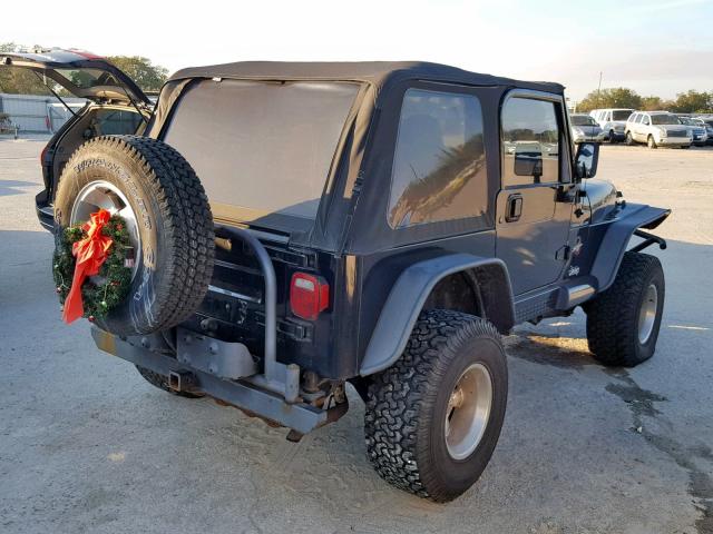 1J4FA59S52P715644 - 2002 JEEP WRANGLER / BLACK photo 4