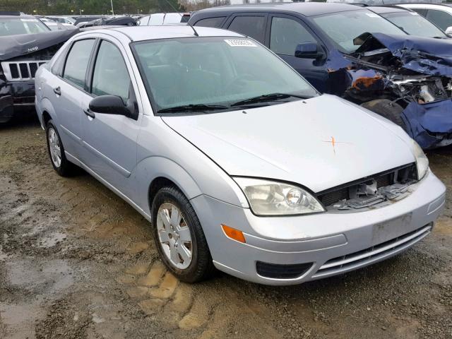 1FAFP34NX7W106739 - 2007 FORD FOCUS ZX4 SILVER photo 1