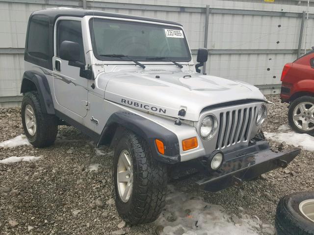 1J4FA69SX4P773984 - 2004 JEEP WRANGLER / SILVER photo 1