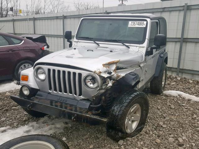 1J4FA69SX4P773984 - 2004 JEEP WRANGLER / SILVER photo 2