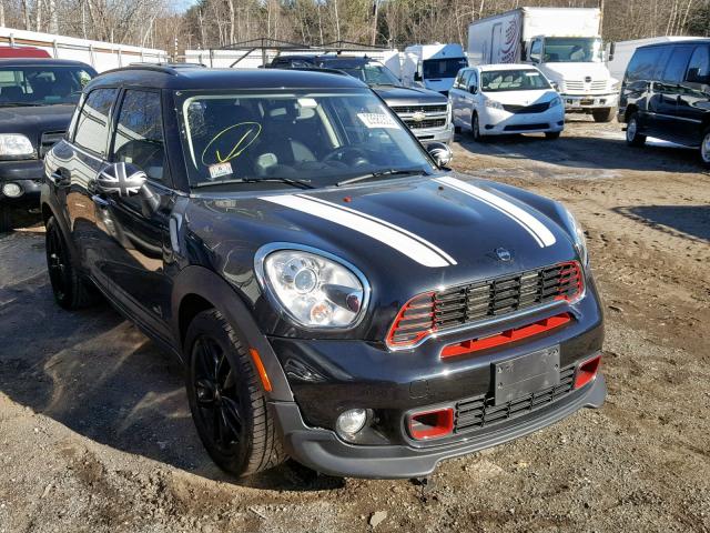 WMWZC5C59BWM10652 - 2011 MINI COOPER S C BLACK photo 1