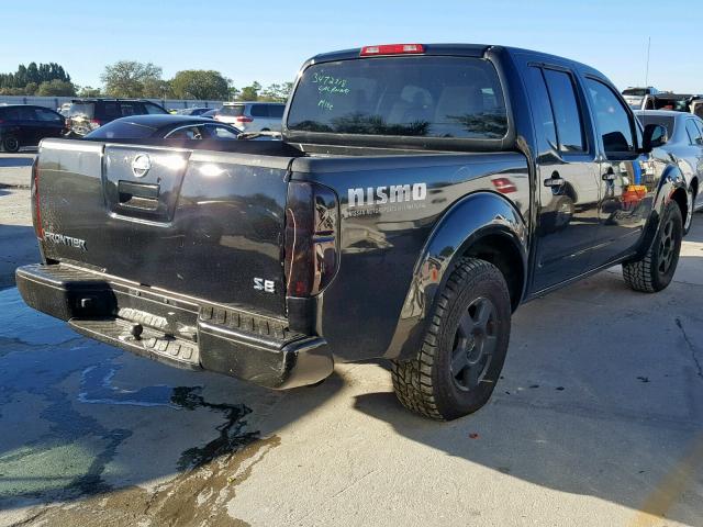 1N6AD07U26C411597 - 2006 NISSAN FRONTIER C BLACK photo 4