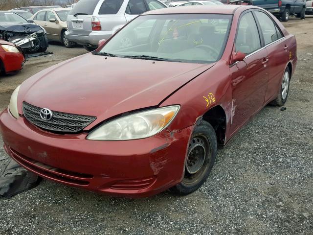 4T1BE32K12U083066 - 2002 TOYOTA CAMRY LE RED photo 2