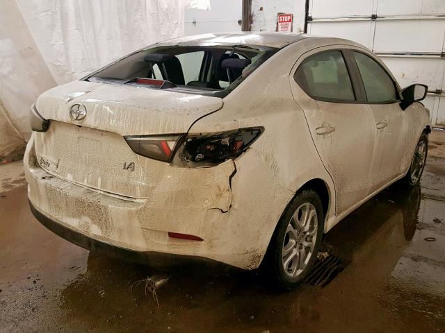 3MYDLBZV5GY103144 - 2016 TOYOTA SCION IA WHITE photo 4