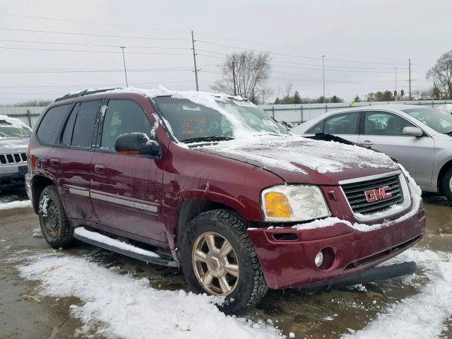 1GKDT13S722417932 - 2002 GMC ENVOY MAROON photo 1