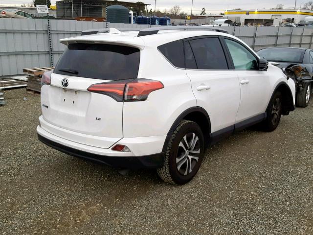 2T3ZFREV8HW370649 - 2017 TOYOTA RAV4 LE WHITE photo 4