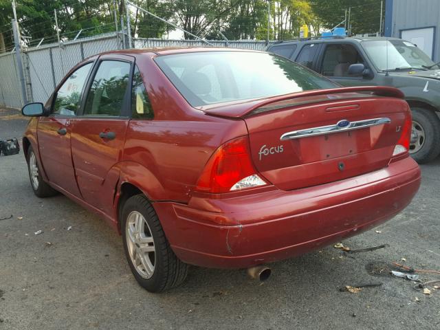 1FAFP33P0YW228949 - 2000 FORD FOCUS LX RED photo 3