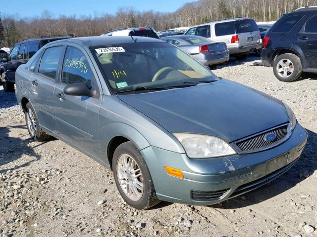 1FAFP34N15W270703 - 2005 FORD FOCUS ZX4 GRAY photo 1
