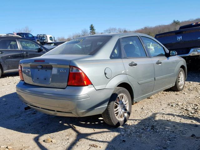 1FAFP34N15W270703 - 2005 FORD FOCUS ZX4 GRAY photo 4