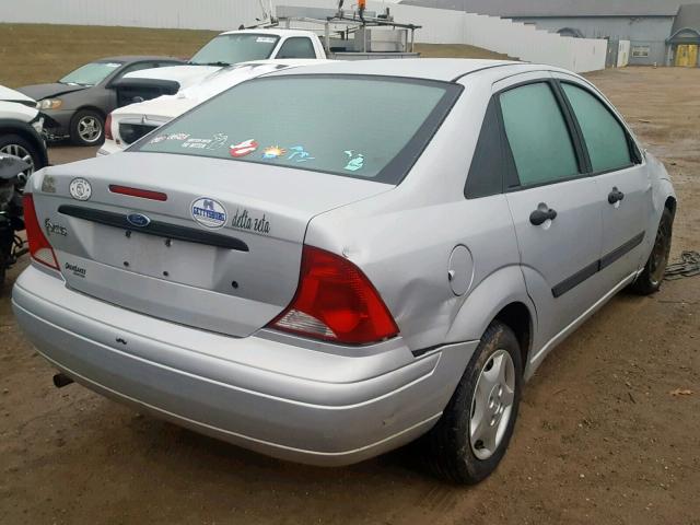 1FAFP33P84W196424 - 2004 FORD FOCUS LX SILVER photo 4