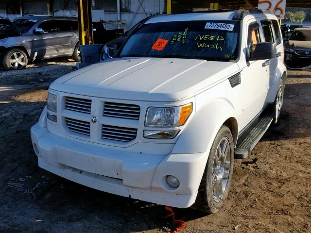 1D4PT5GK9AW111030 - 2010 DODGE NITRO SXT WHITE photo 2