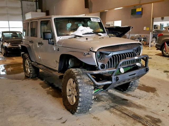 1J4BA7H13BL590797 - 2011 JEEP WRANGLER U GRAY photo 1