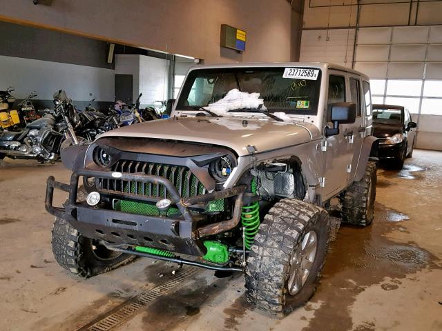 1J4BA7H13BL590797 - 2011 JEEP WRANGLER U GRAY photo 2