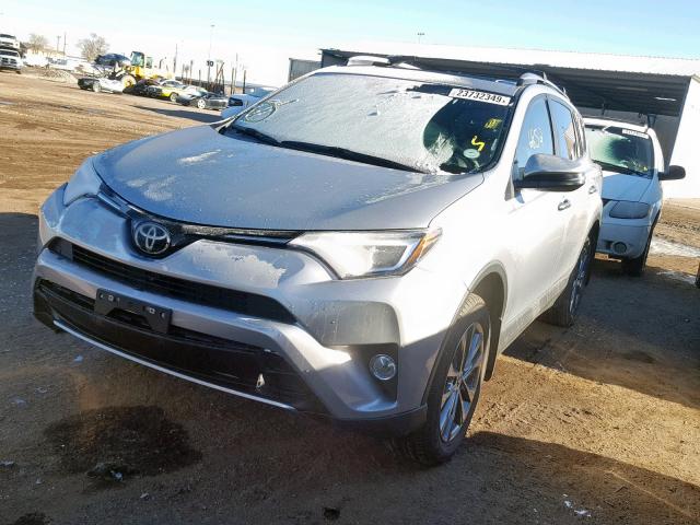 JTMDFREV1JJ192307 - 2018 TOYOTA RAV4 LIMIT TAN photo 2