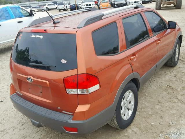 KNDJJ741795015060 - 2009 KIA BORREGO LX ORANGE photo 4