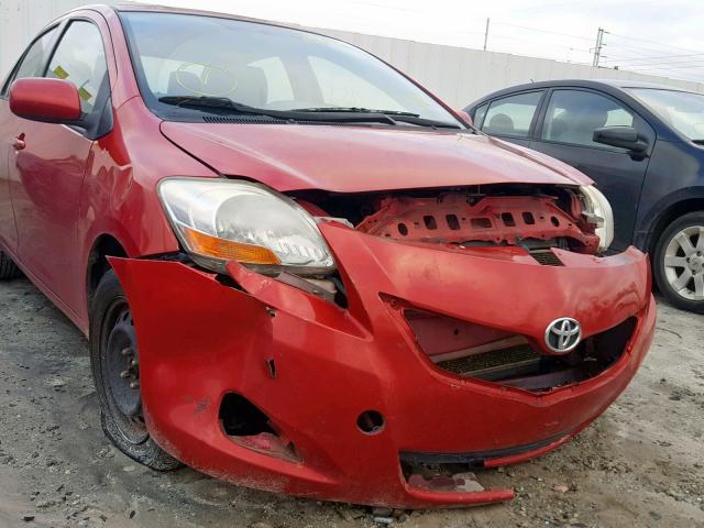 JTDBT4K38B1408175 - 2011 TOYOTA YARIS RED photo 9