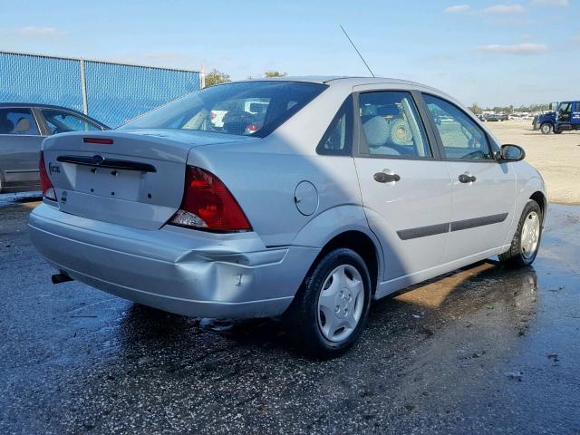 1FAFP33PX4W152473 - 2004 FORD FOCUS LX SILVER photo 4