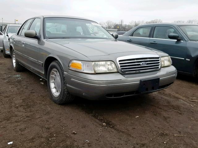 2FAFP74W9XX136593 - 1999 FORD CROWN VICT GRAY photo 1