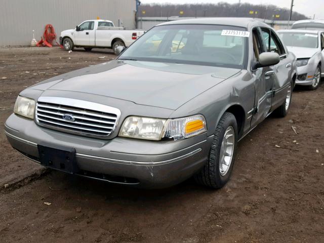 2FAFP74W9XX136593 - 1999 FORD CROWN VICT GRAY photo 2