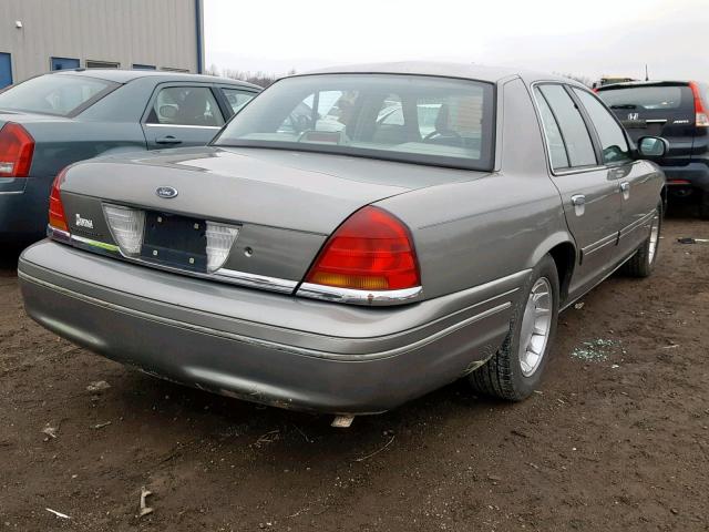 2FAFP74W9XX136593 - 1999 FORD CROWN VICT GRAY photo 4