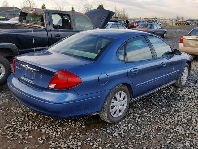 1FAFP53UX2G104092 - 2002 FORD TAURUS SE BLUE photo 4