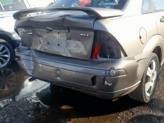 1FAHP34N05W240763 - 2005 FORD FOCUS ZX4 BEIGE photo 9