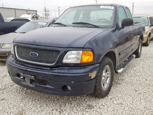 2FTRX17254CA90194 - 2004 FORD F-150 HERI BLUE photo 2