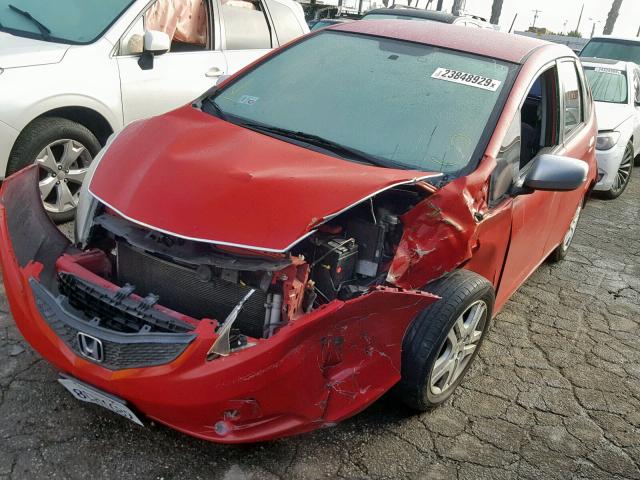 JHMGE882X9S064051 - 2009 HONDA FIT RED photo 2