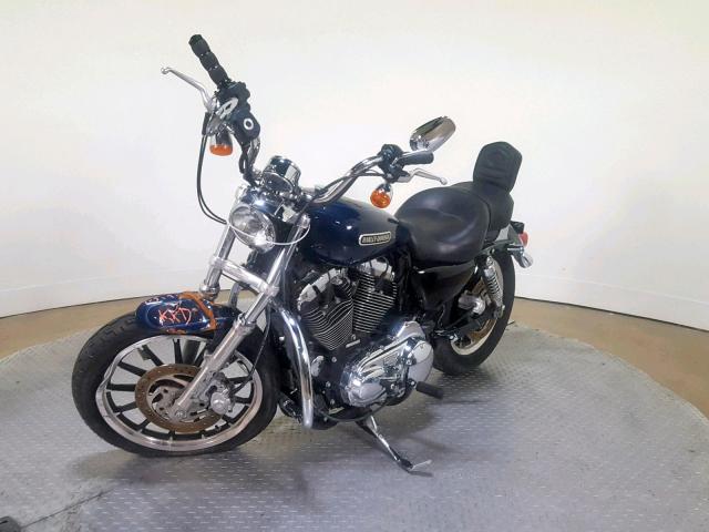 1HD1CX31X9K424097 - 2009 HARLEY-DAVIDSON XL1200 L BLUE photo 4