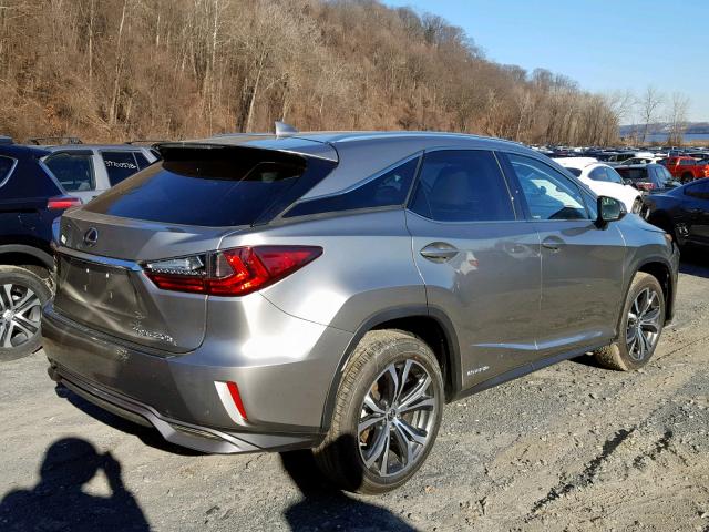 2T2BGMCA2JC029311 - 2018 LEXUS RX 450H SILVER photo 4