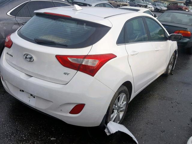 KMHD35LE6DU125155 - 2013 HYUNDAI ELANTRA GT WHITE photo 4