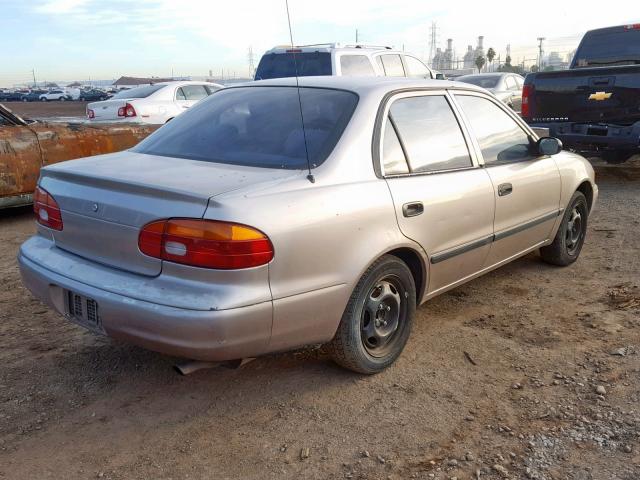 1Y1SK528XWZ442786 - 1998 CHEVROLET GEO PRIZM TAN photo 4