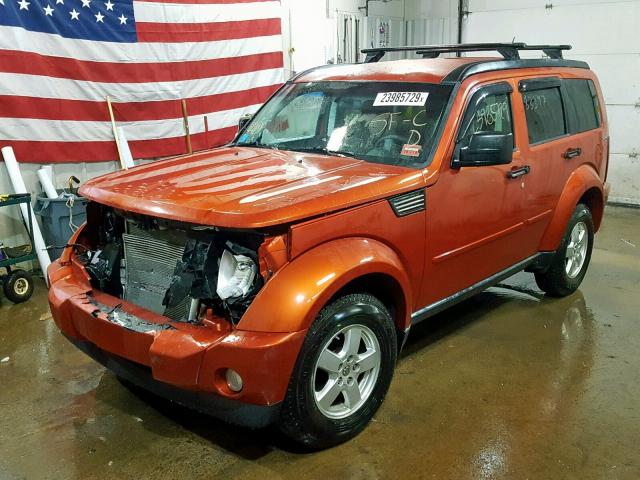 1D8GU28KX9W530296 - 2009 DODGE NITRO SE ORANGE photo 2