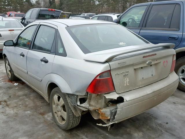 1FAHP34N07W191325 - 2007 FORD FOCUS ZX4 SILVER photo 9