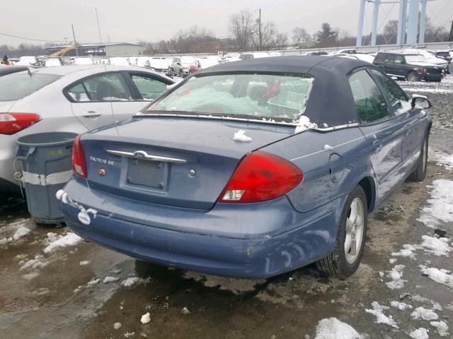 1FAFP55U7YA103619 - 2000 FORD TAURUS SES BLUE photo 4