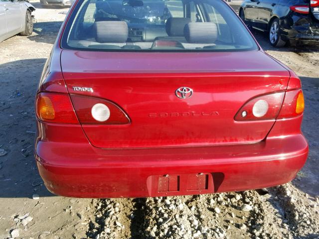 2T1BR12E52C579394 - 2002 TOYOTA COROLLA CE Tünd qırmızı foto 9