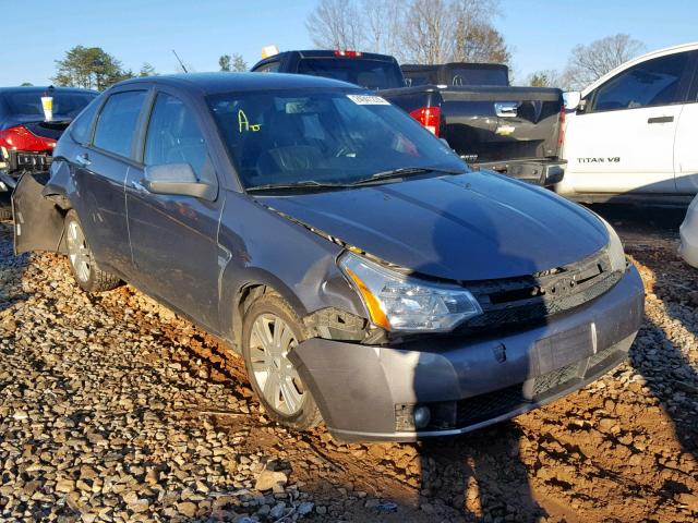 1FAHP37N49W190824 - 2009 FORD FOCUS SEL GRAY photo 1