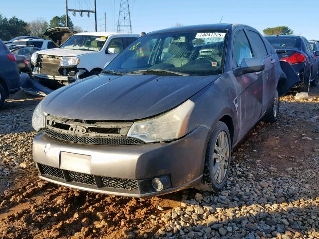 1FAHP37N49W190824 - 2009 FORD FOCUS SEL GRAY photo 2