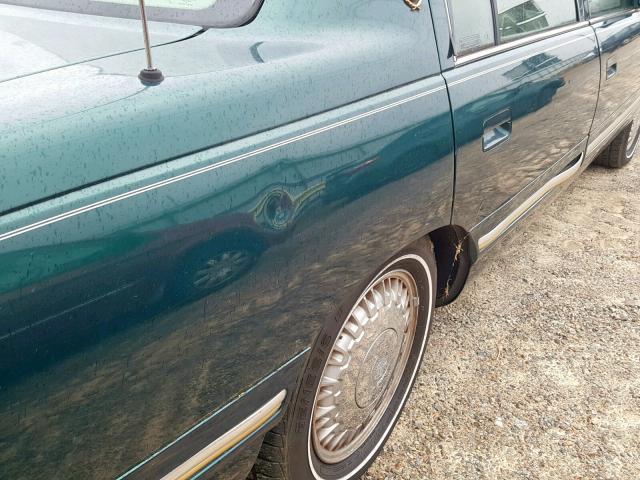 1G6KE54Y8XU708428 - 1999 CADILLAC DEVILLE DE GREEN photo 9