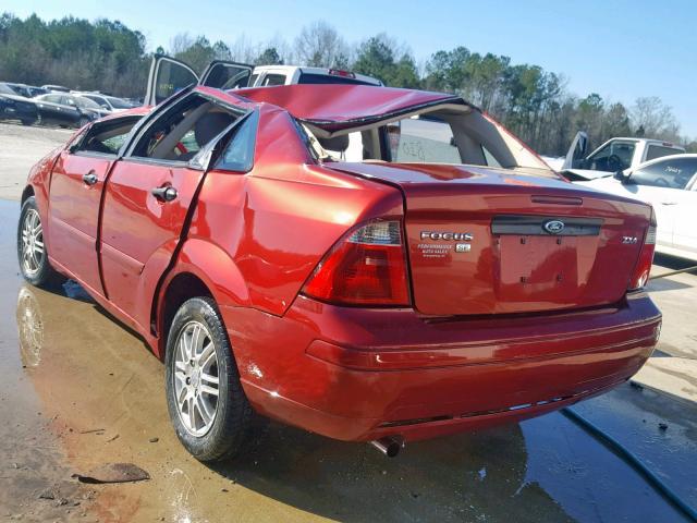 1FAFP34N85W237942 - 2005 FORD FOCUS ZX4 RED photo 3